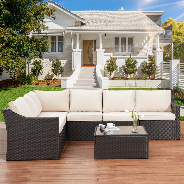 Oyerol 7 Piece Rattan Sectional Seating Group with Cushions Wayfair